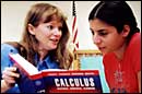 Goal 1 Image: Teacher and student