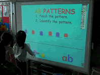 student at whiteboard