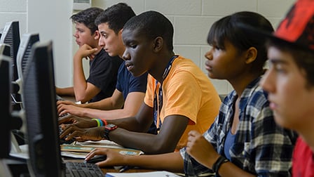 Some students working at computers