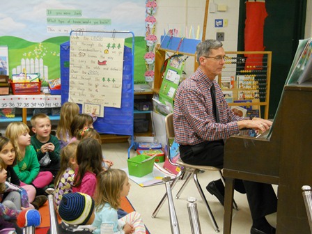 Dr Bray plays the piano