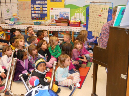 Kindergarten and Principal sing Over the River