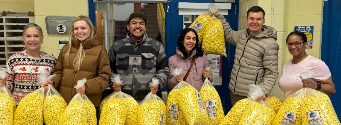 Volunteers with popcorn