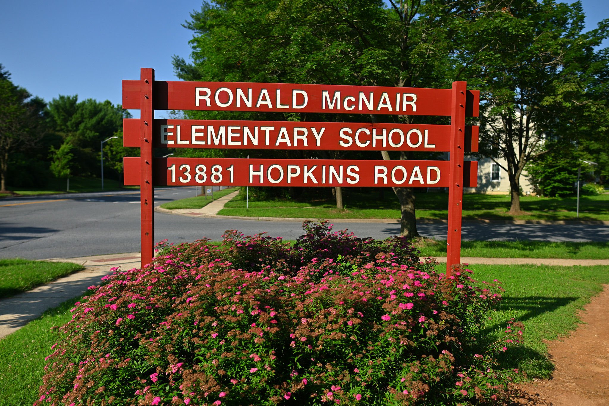 Sign with school name and address