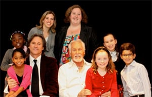 Strathmore ES students perform with Kenny Rogers