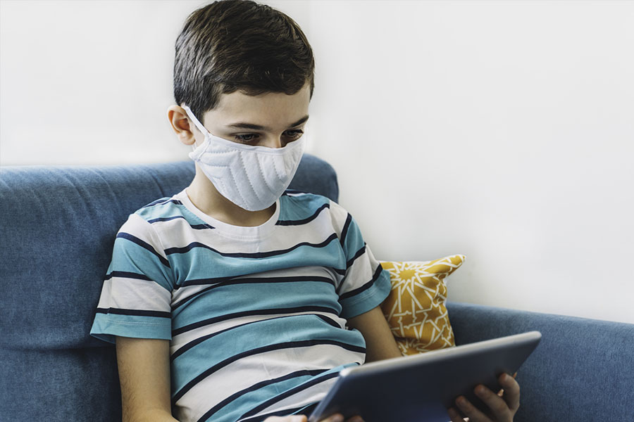 boy wearing mask